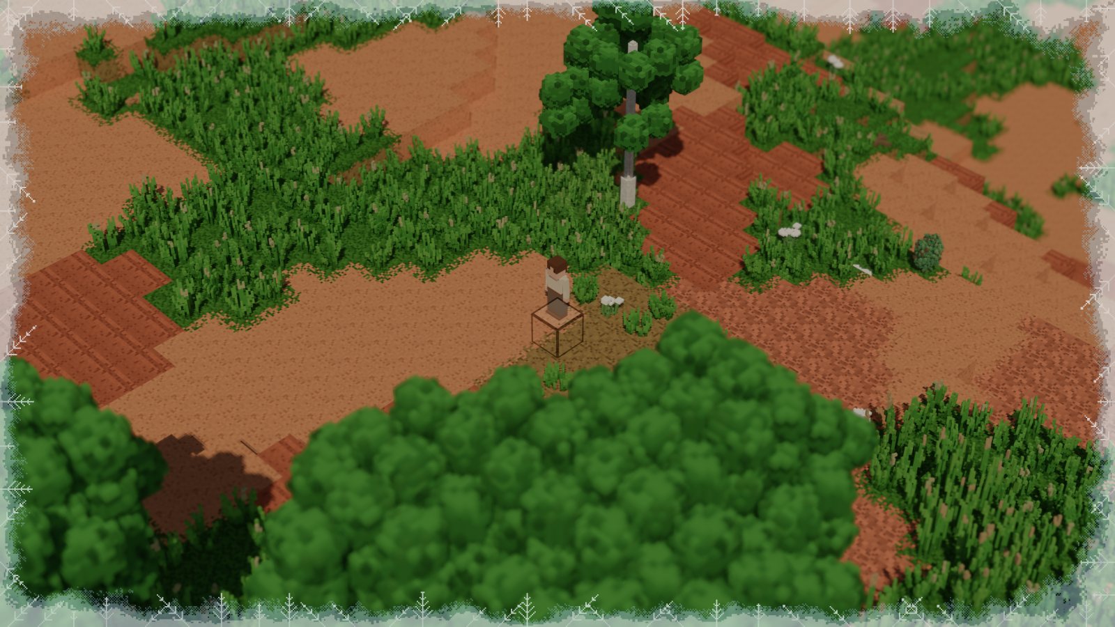 Red canyon ground with green brush and a lone tree